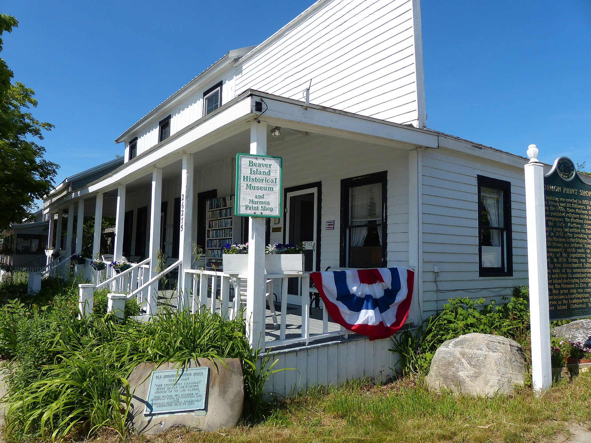 The white clapboard Old Mormon Print Shop, home of the Beaver Island Historical Society museum in St. James