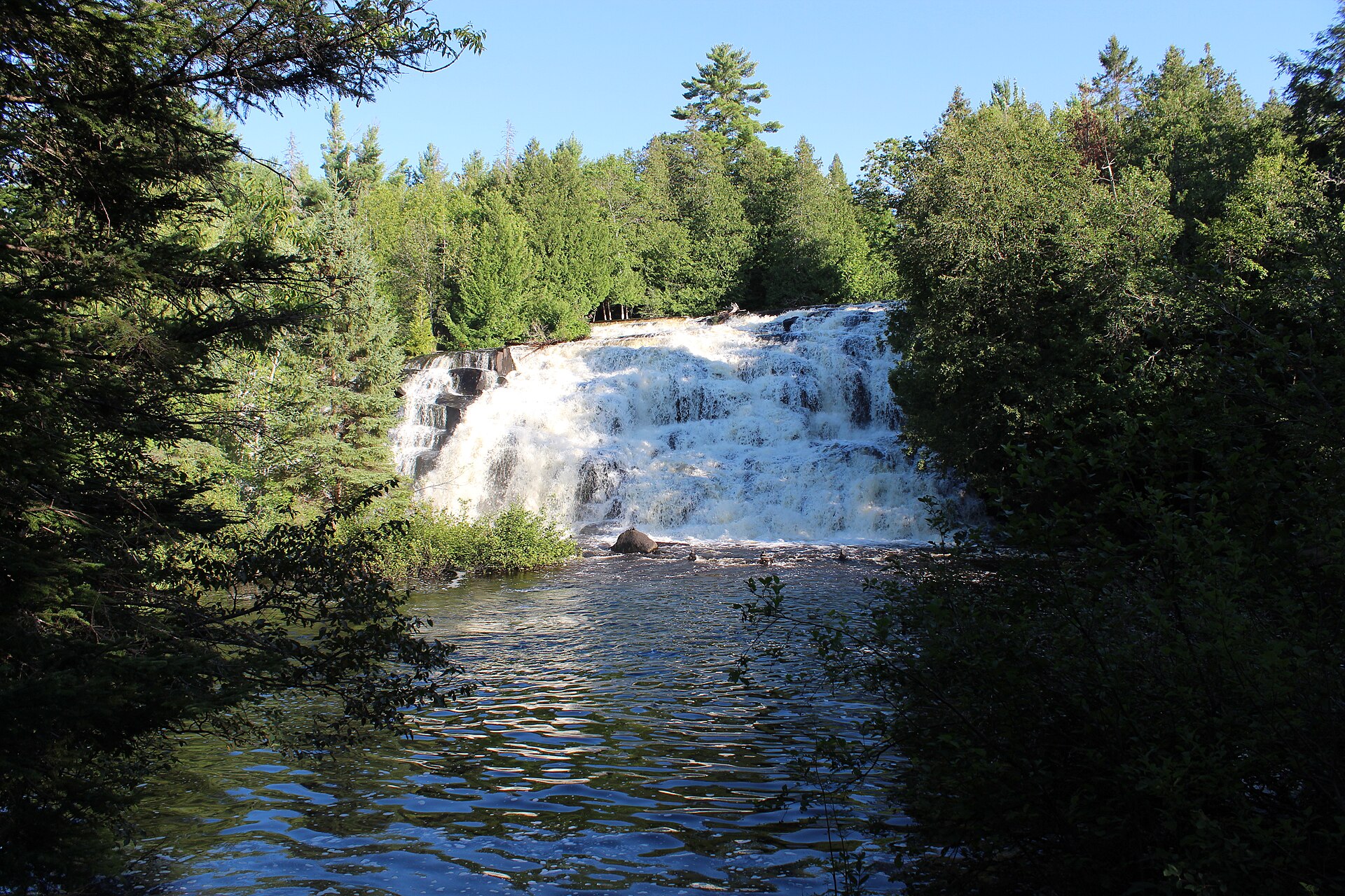 Bond Falls cascading over rock ledges on the Middle Branch of the Ontonagon River near Paulding, Michigan
