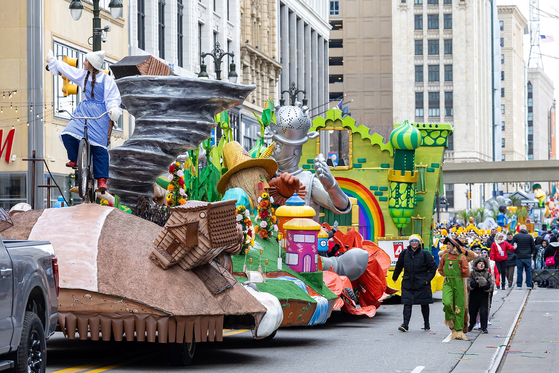 Wizard of Oz floats rolling down Woodward Avenue in downtown Detroit during the 2025 America's Thanksgiving Parade
